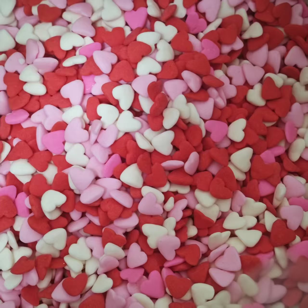 Sprinkles corazón rosado, rojo, blanco x 500 gr